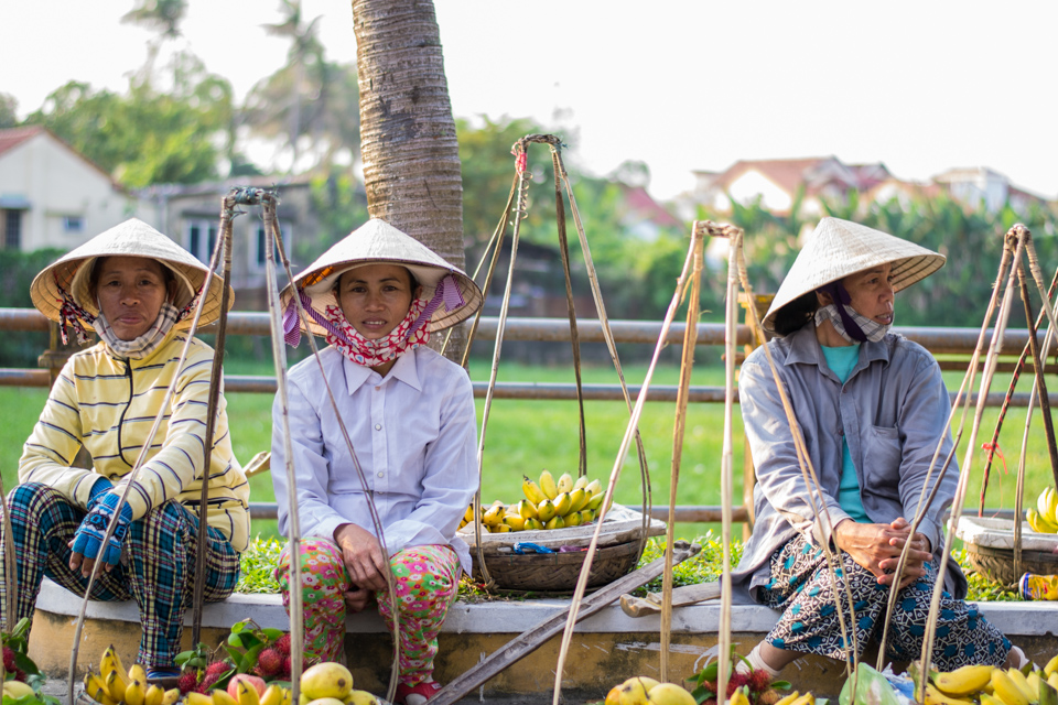 Vietnamese women in cone hats