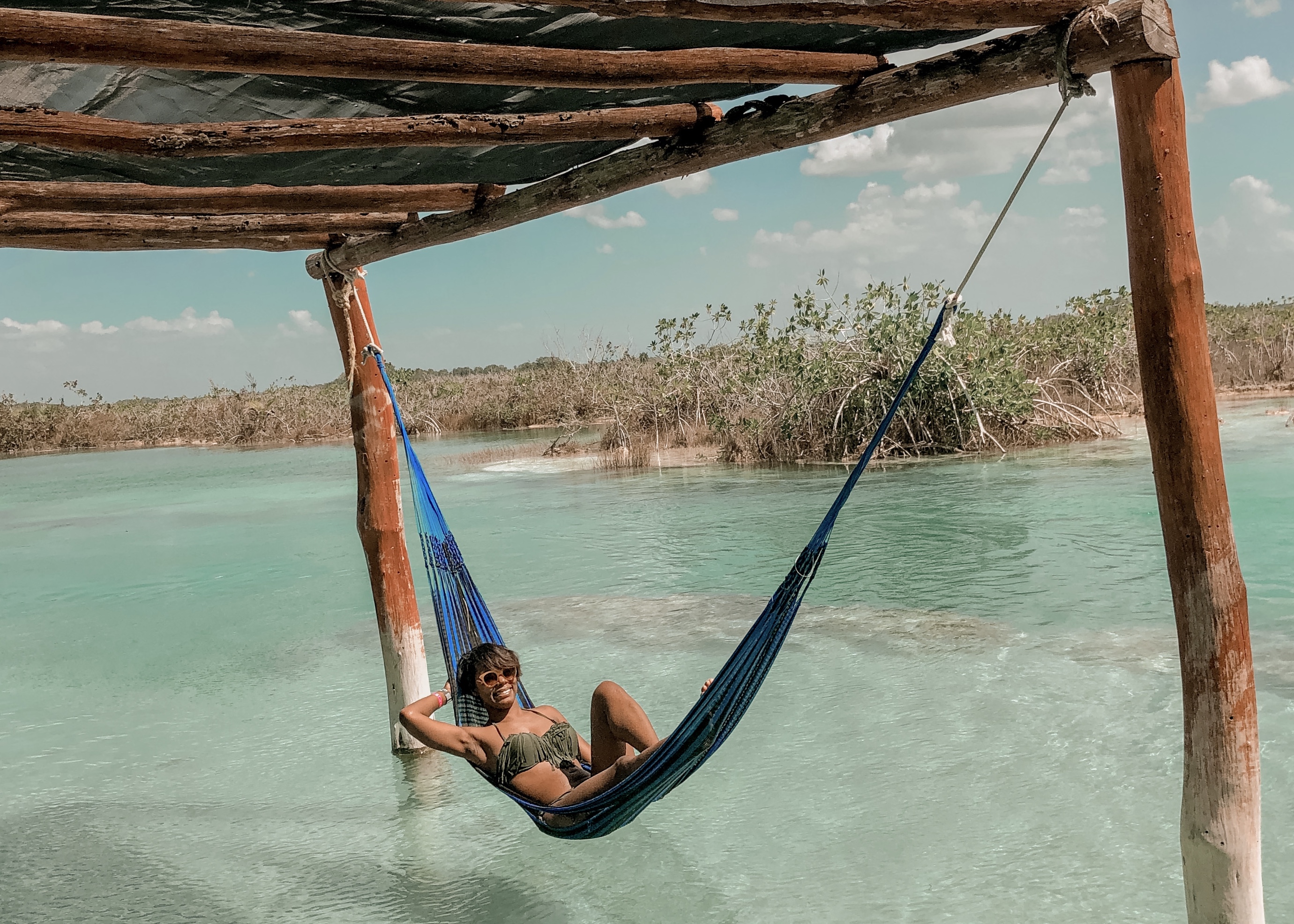 Is 'Better Late Than Never' Best? Moving Abroad After 30: Black woman in a hammock in Bacalar, Mexico