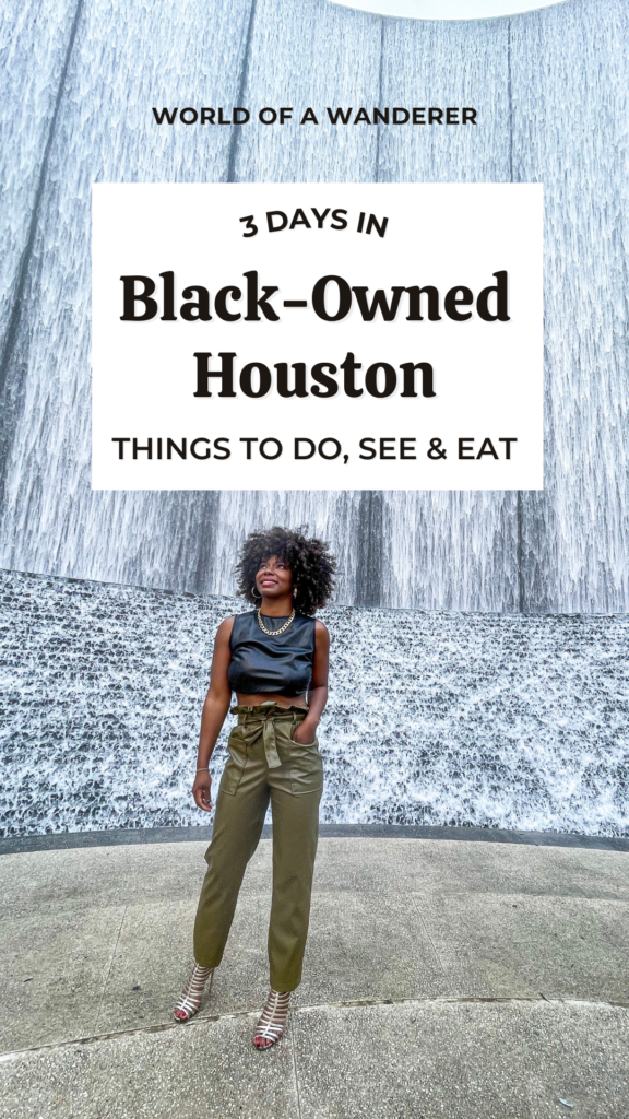 Black woman in front of waterfall 