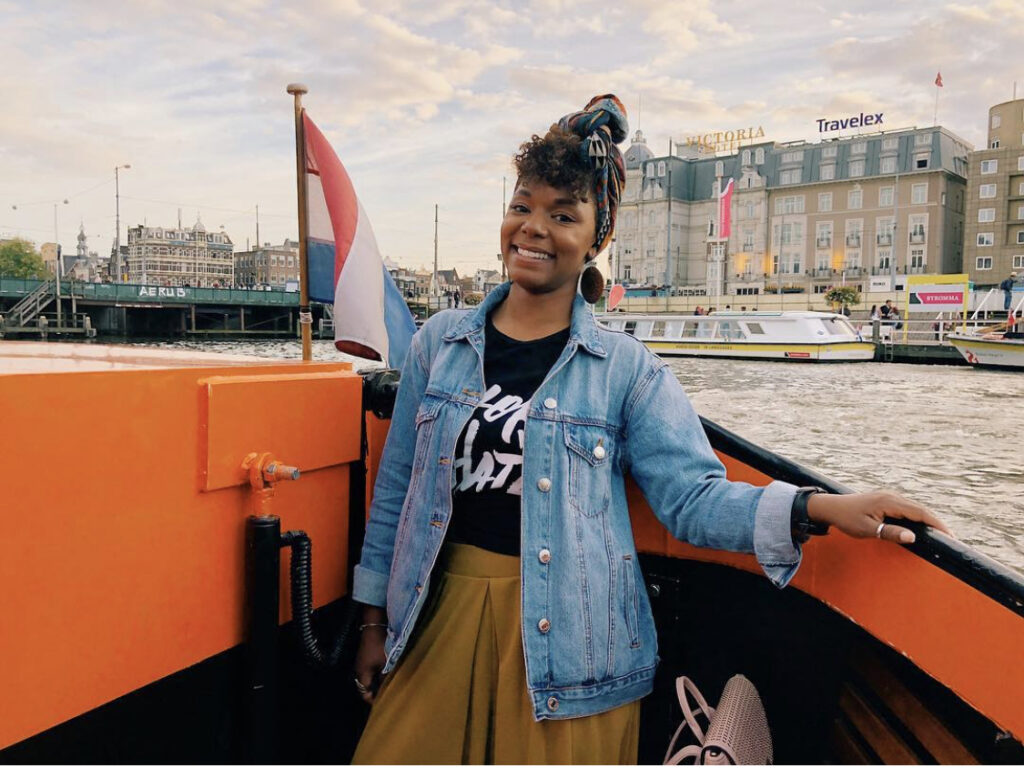 Black woman on boat in Amsterdam